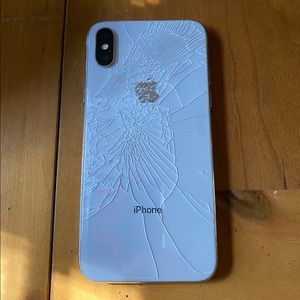 iPhone X, AT&T. Works perfect, cracked back screen